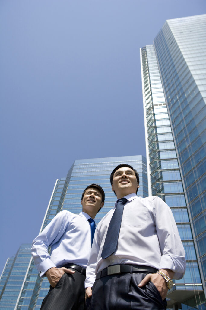 Chinese Businessmen In Front Of A Office Tower 2026 01 11 11 12 46 Utc 683x1024